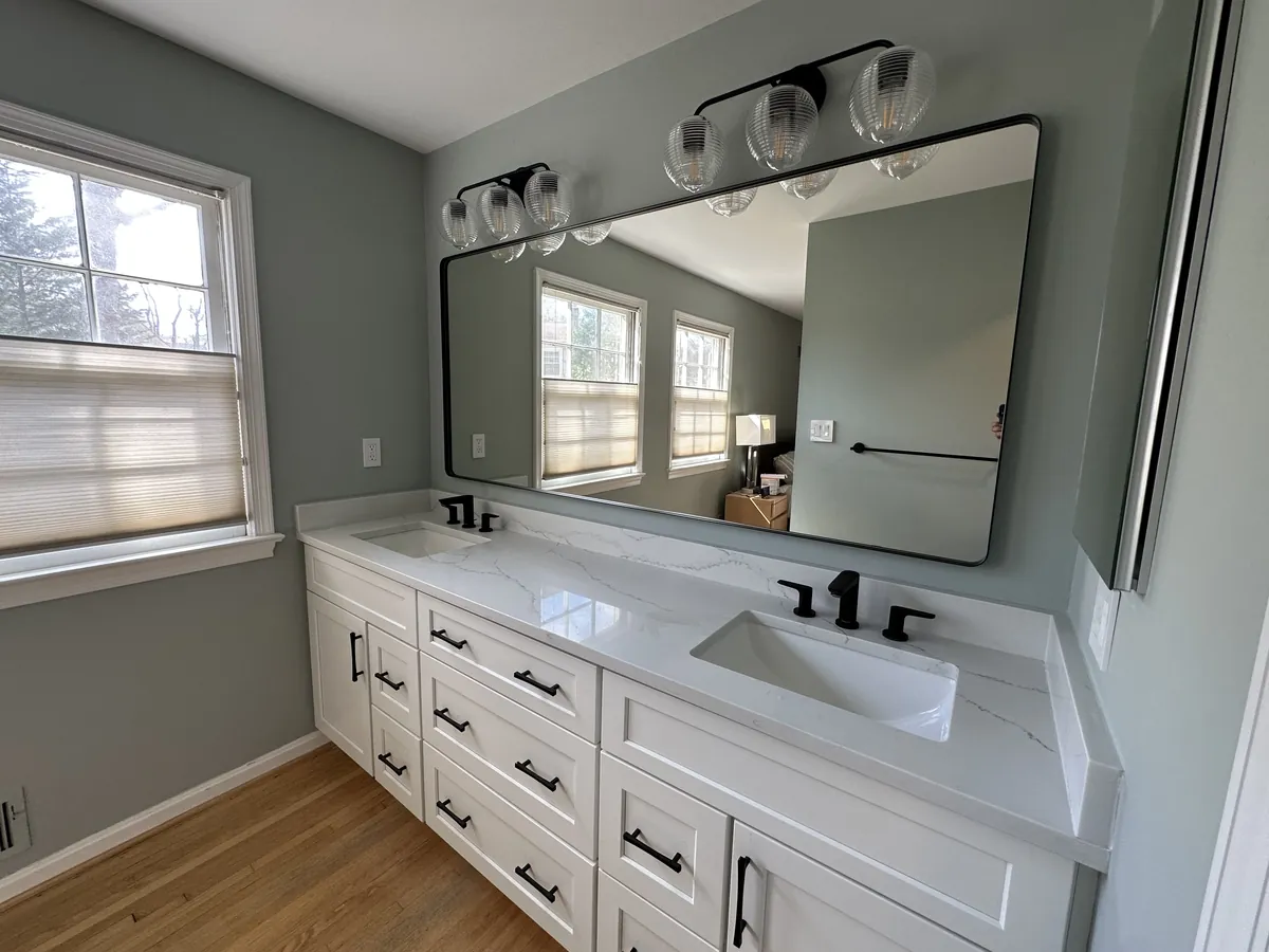 Double vanity with quartz top and matte black fixtures