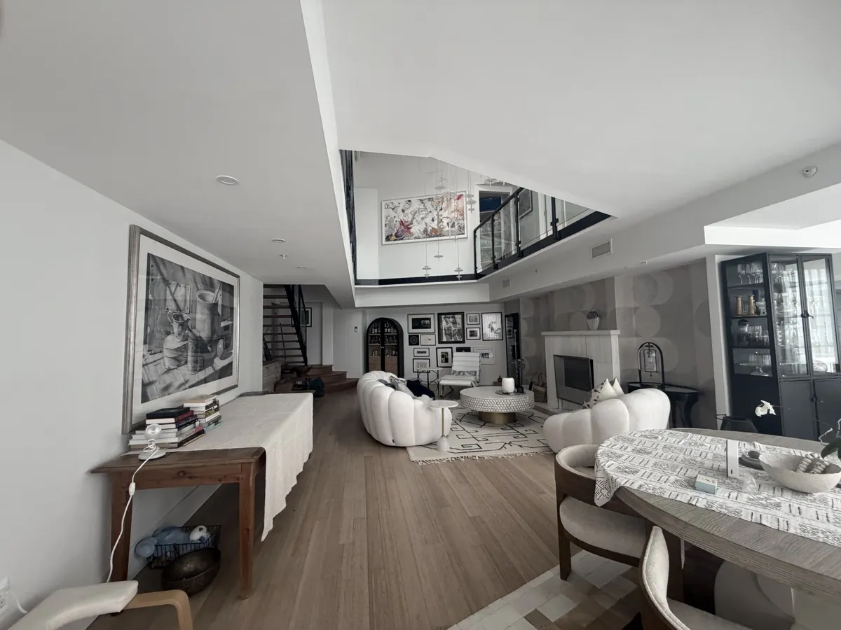 Open living and dining beneath the loft